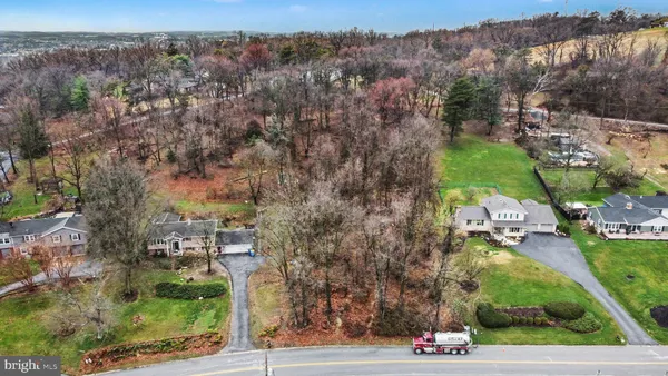 an aerial view of residential house with outdoor space