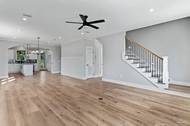 a view of a livingroom with a hardwood floor