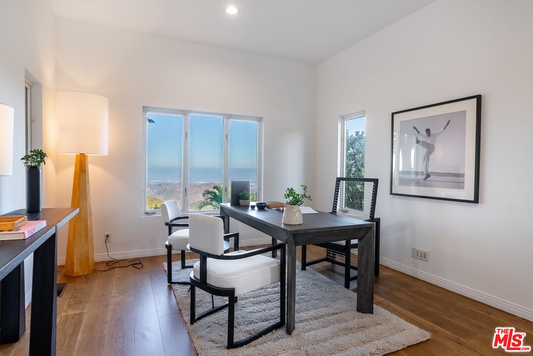 21965 Saddle Peak Road Topanga, CA 90290 - Photo 26 of 56 a view of a workspace with furniture and a window