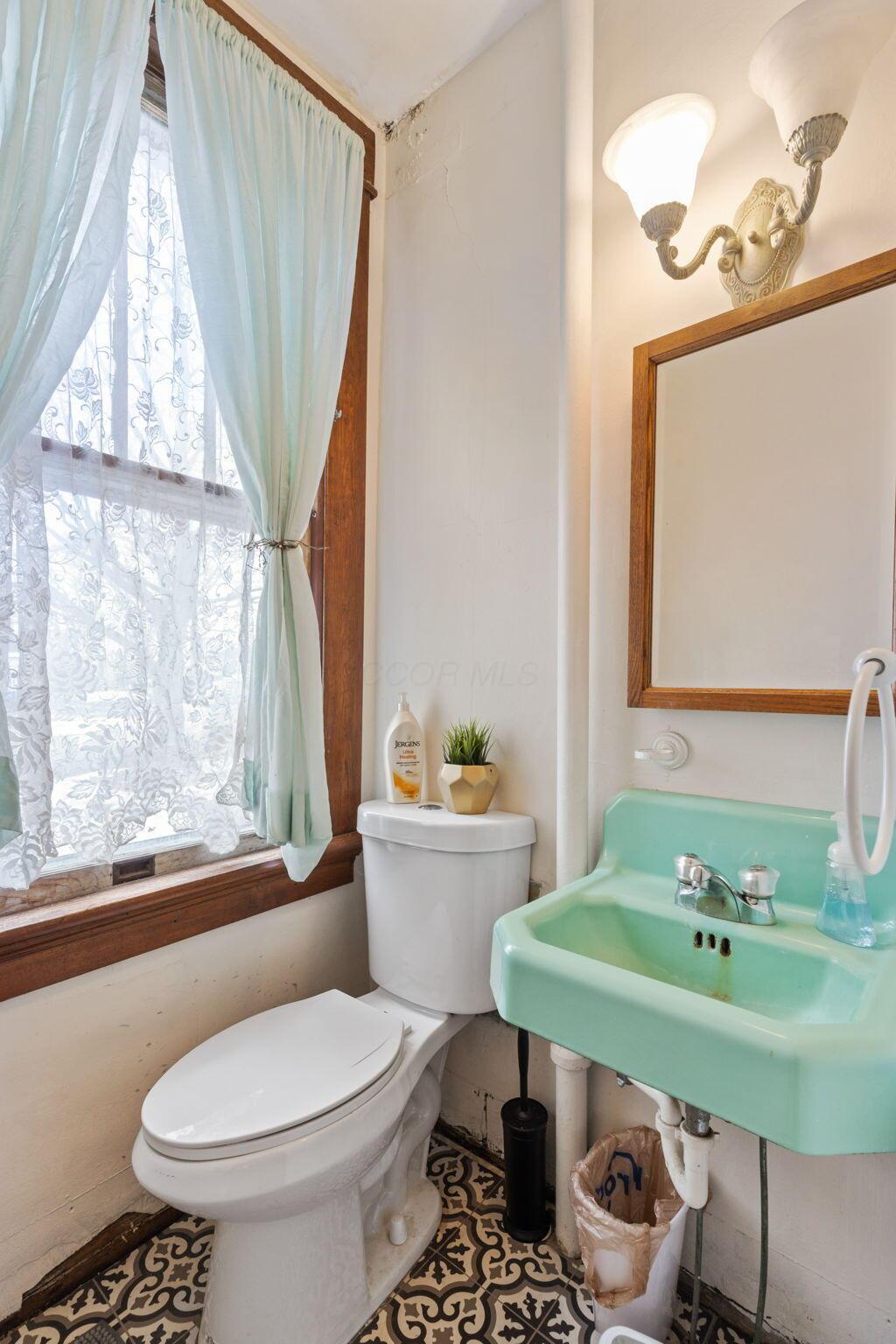 120 West Market Street Baltimore, OH 43105 - Photo 22 of 47 1st Floor Half Bath - 120 W Market Street, Baltimore, OH 43105