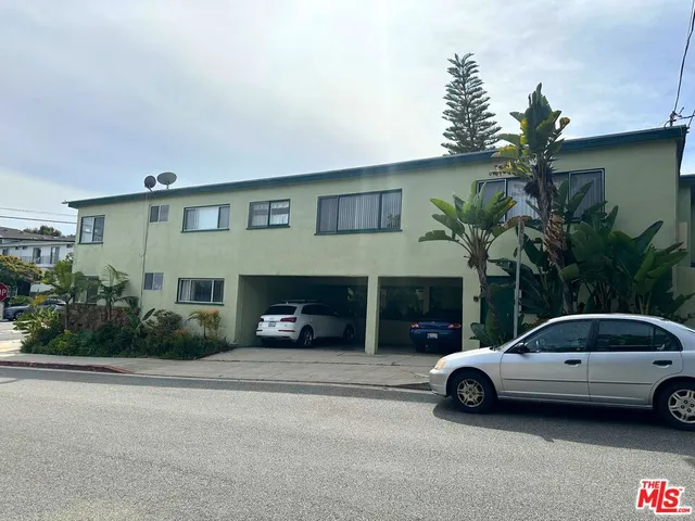 a car parked in front of a house