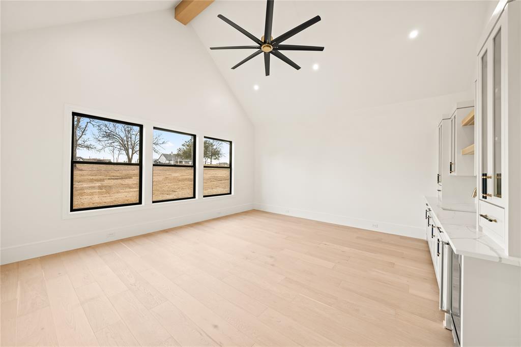 204 Dan Russell Weatherford, TX 76087 - Photo 15 of 40 an empty room with windows and ceiling fan