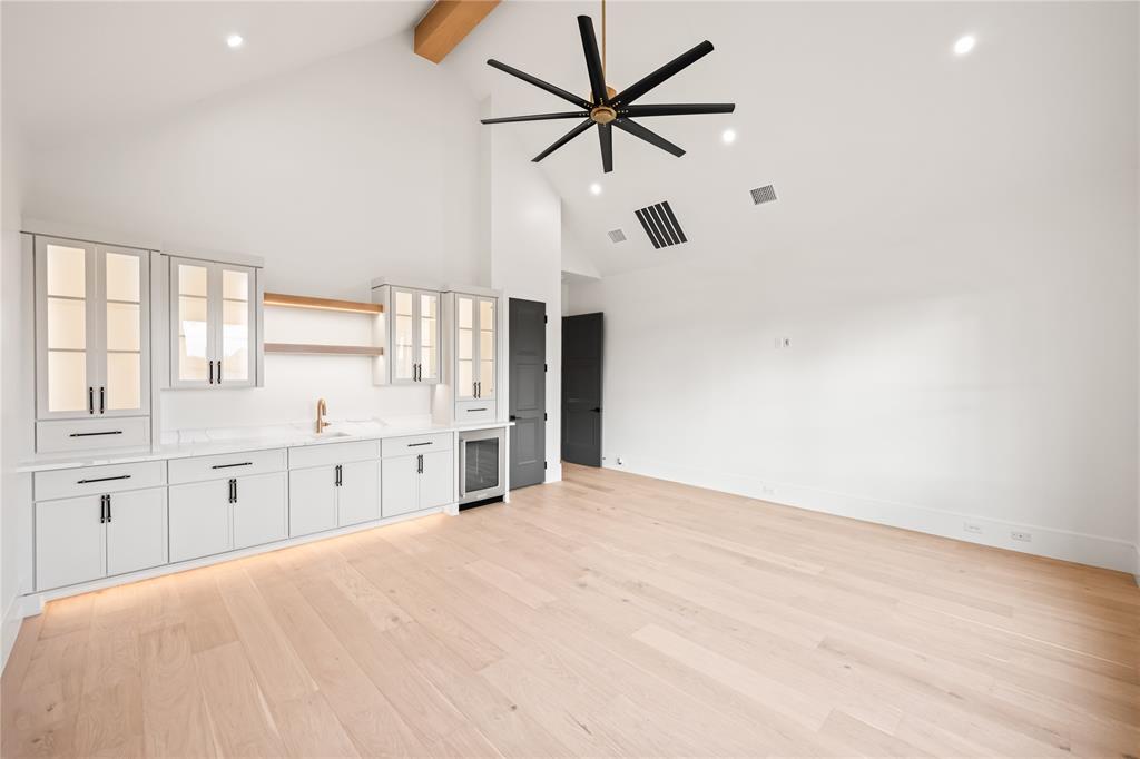 204 Dan Russell Weatherford, TX 76087 - Photo 16 of 40 a large white kitchen with a large window appliances and cabinets