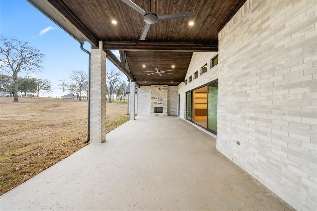 204 Dan Russell Weatherford, TX 76087 - Photo 37 of 40 a view of a hallway with wooden floor