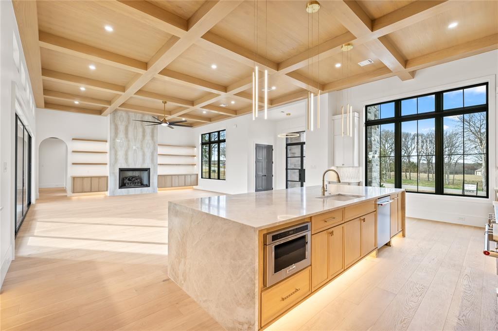 204 Dan Russell Weatherford, TX 76087 - Photo 10 of 40 a large white kitchen with a large window