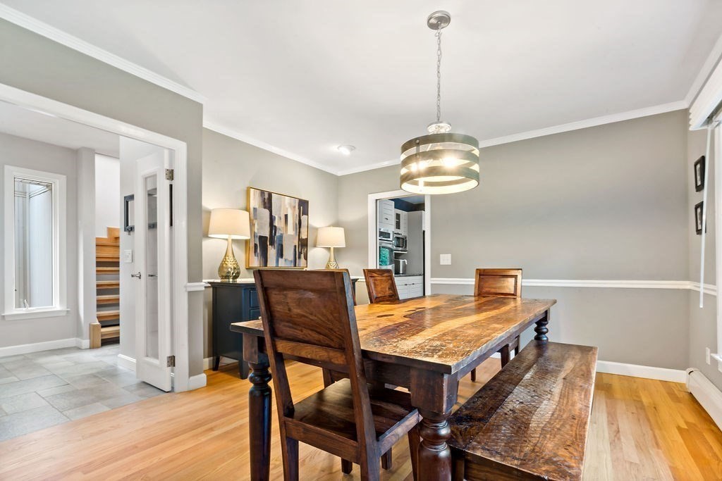 25 Hickory Ridge Road Rehoboth, MA 02769 - Photo 15 of 42 a view of a dining room with furniture window and wooden floor