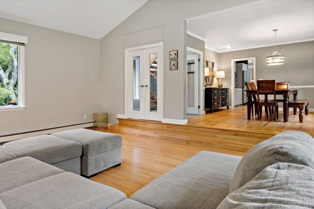 25 Hickory Ridge Road Rehoboth, MA 02769 - Photo 17 of 42 a spacious bedroom with a bed and glass windows