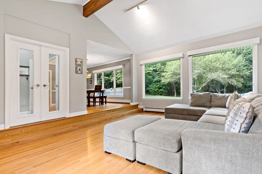 25 Hickory Ridge Road Rehoboth, MA 02769 - Photo 19 of 42 a living room with furniture and a large window