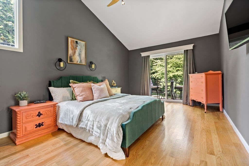 25 Hickory Ridge Road Rehoboth, MA 02769 - Photo 22 of 42 a bed sitting in a bedroom next to a window