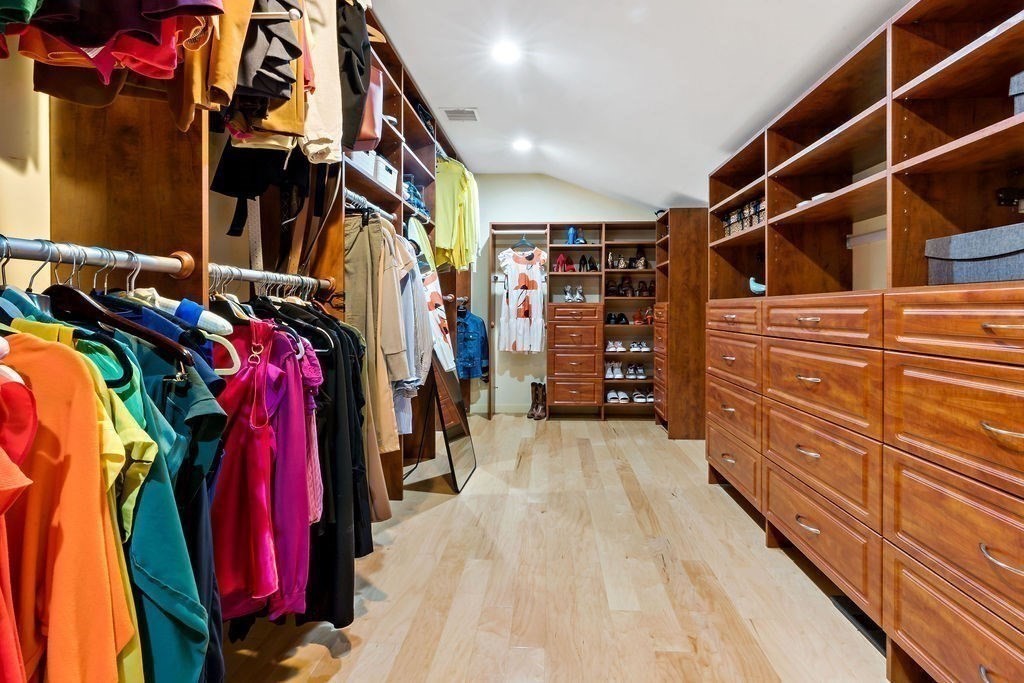 25 Hickory Ridge Road Rehoboth, MA 02769 - Photo 26 of 42 a view of walk in closet with clothes and shoes