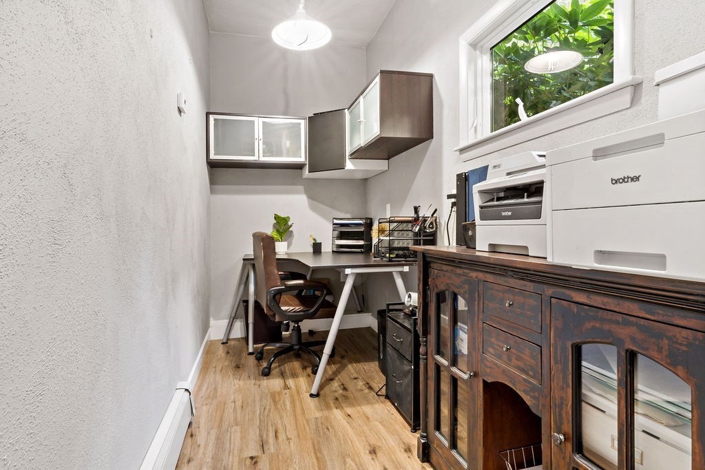 25 Hickory Ridge Road Rehoboth, MA 02769 - Photo 36 of 42 a kitchen with stainless steel appliances granite countertop a sink a stove and a wooden floors