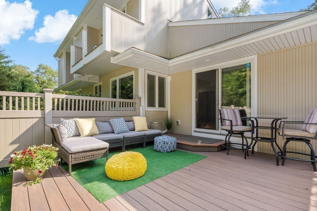 25 Hickory Ridge Road Rehoboth, MA 02769 - Photo 40 of 42 a outdoor living space with furniture and wooden floor