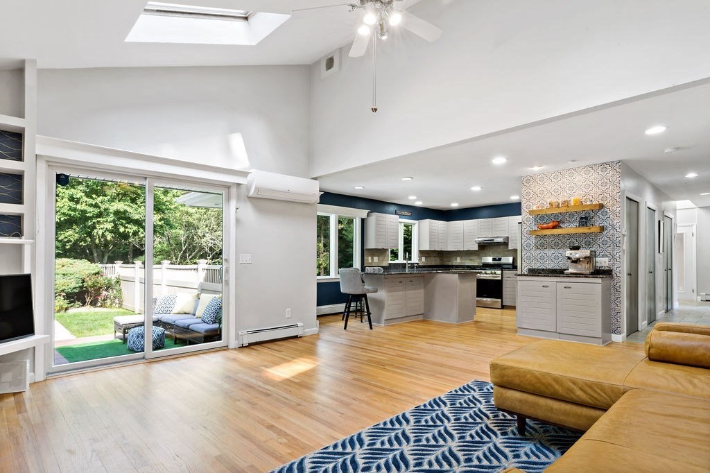 25 Hickory Ridge Road Rehoboth, MA 02769 - Photo 5 of 42 a living room with stainless steel appliances furniture and a large window