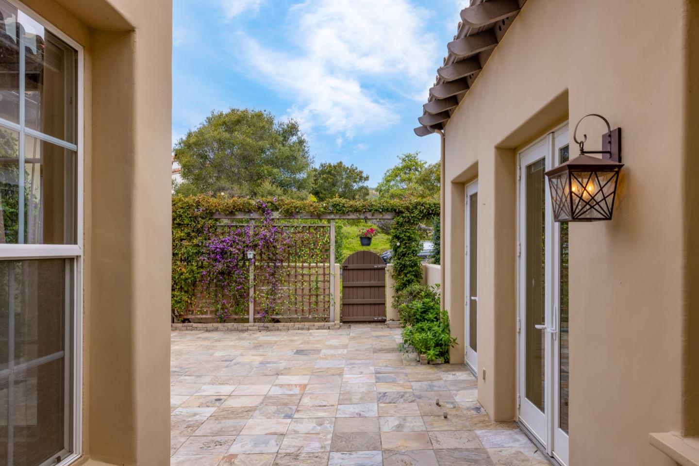 306 Pasadera Drive Monterey, CA 93940 - Photo 11 of 55 a view of a door and car parked in garage