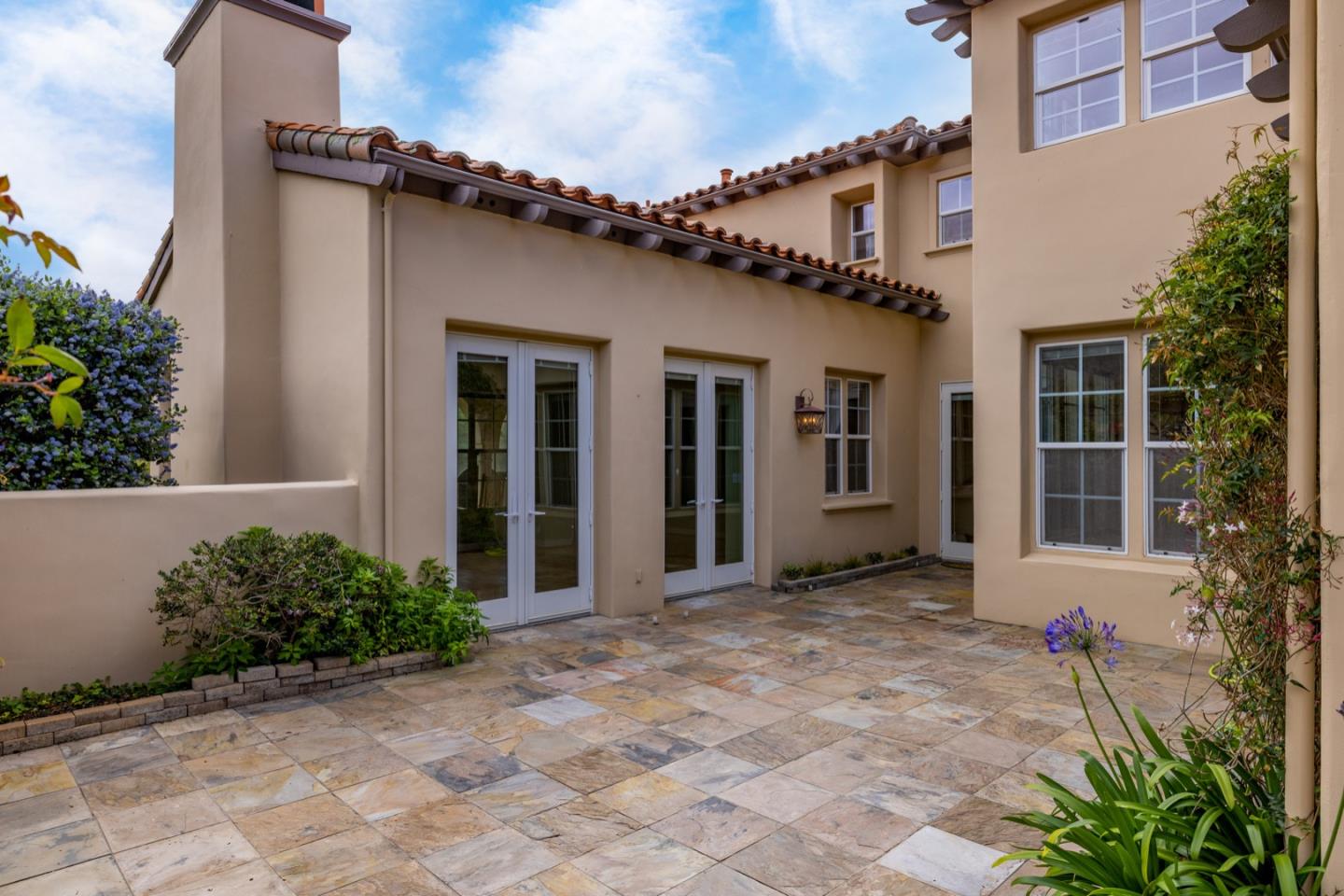 306 Pasadera Drive Monterey, CA 93940 - Photo 14 of 55 a front view of a house with garden