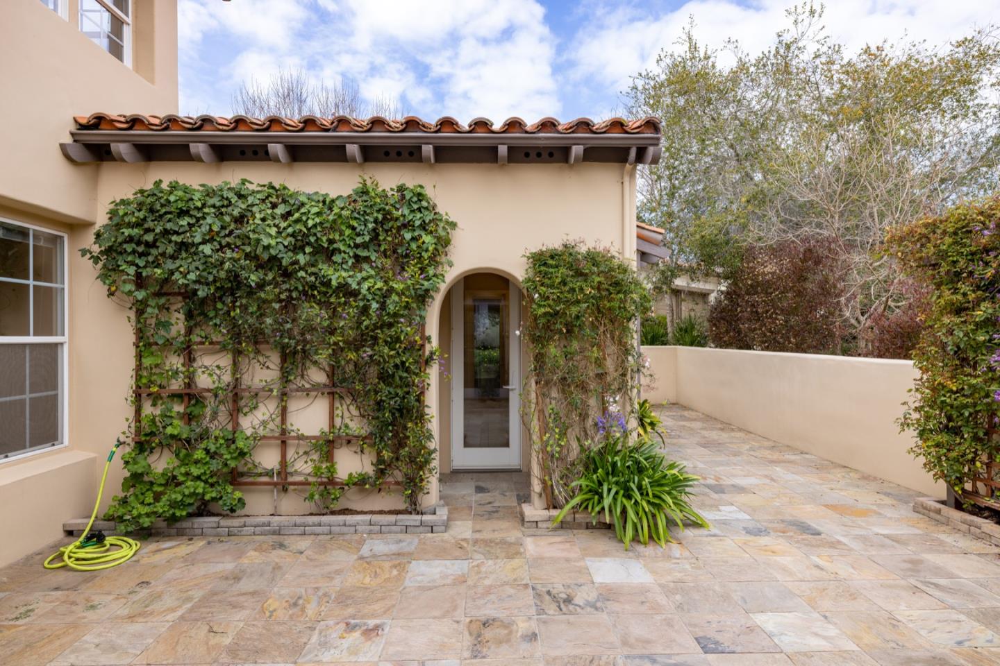 306 Pasadera Drive Monterey, CA 93940 - Photo 15 of 55 a front view of a house with garden