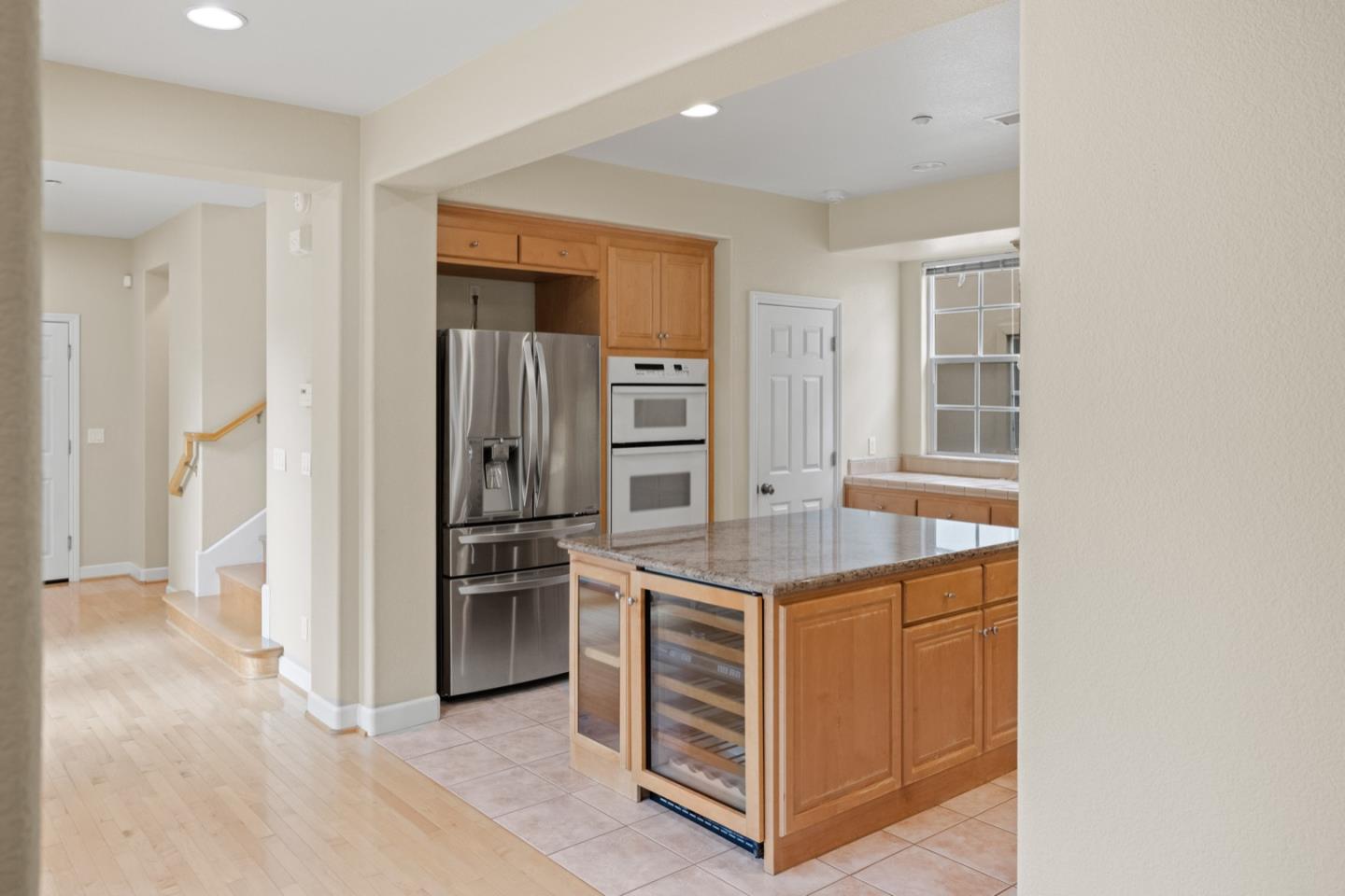306 Pasadera Drive Monterey, CA 93940 - Photo 18 of 55 a kitchen with stainless steel appliances a stove and refrigerator
