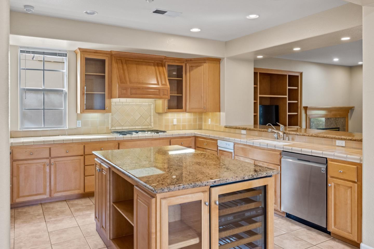306 Pasadera Drive Monterey, CA 93940 - Photo 19 of 55 a kitchen with kitchen island granite countertop a sink and counter space