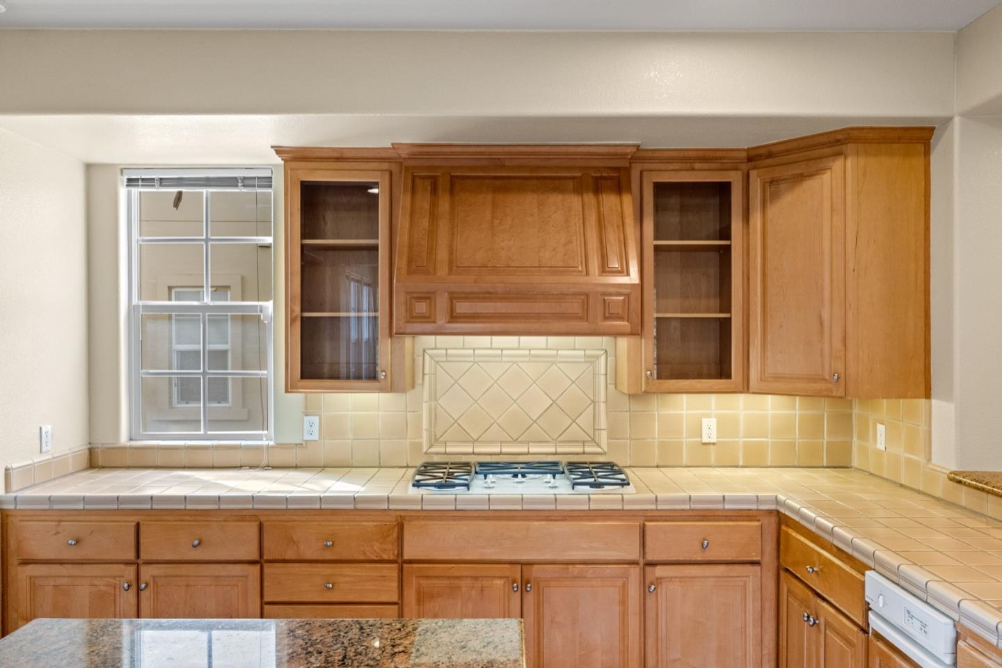 306 Pasadera Drive Monterey, CA 93940 - Photo 20 of 55 a view of a kitchen with granite countertop cabinets