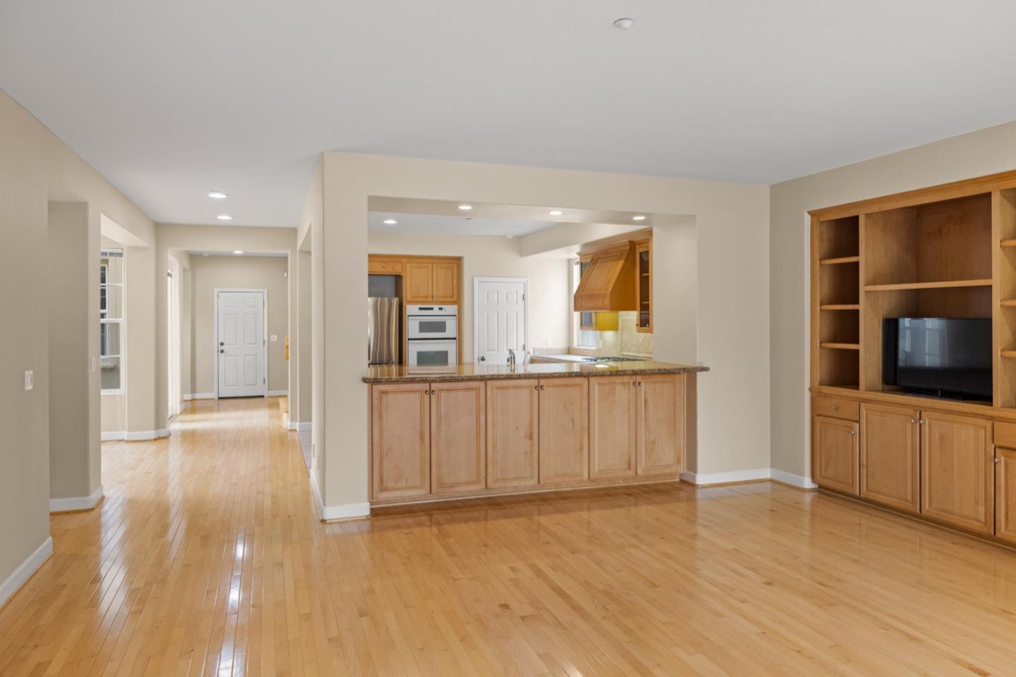 306 Pasadera Drive Monterey, CA 93940 - Photo 25 of 55 a view of a kitchen with a sink and a refrigerator