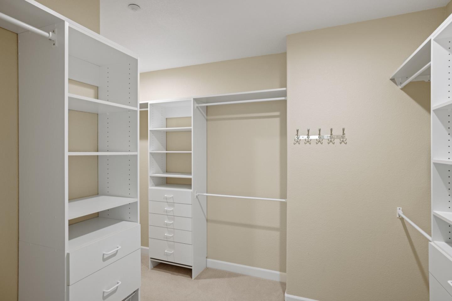 306 Pasadera Drive Monterey, CA 93940 - Photo 34 of 55 a view of walk in closet with empty racks