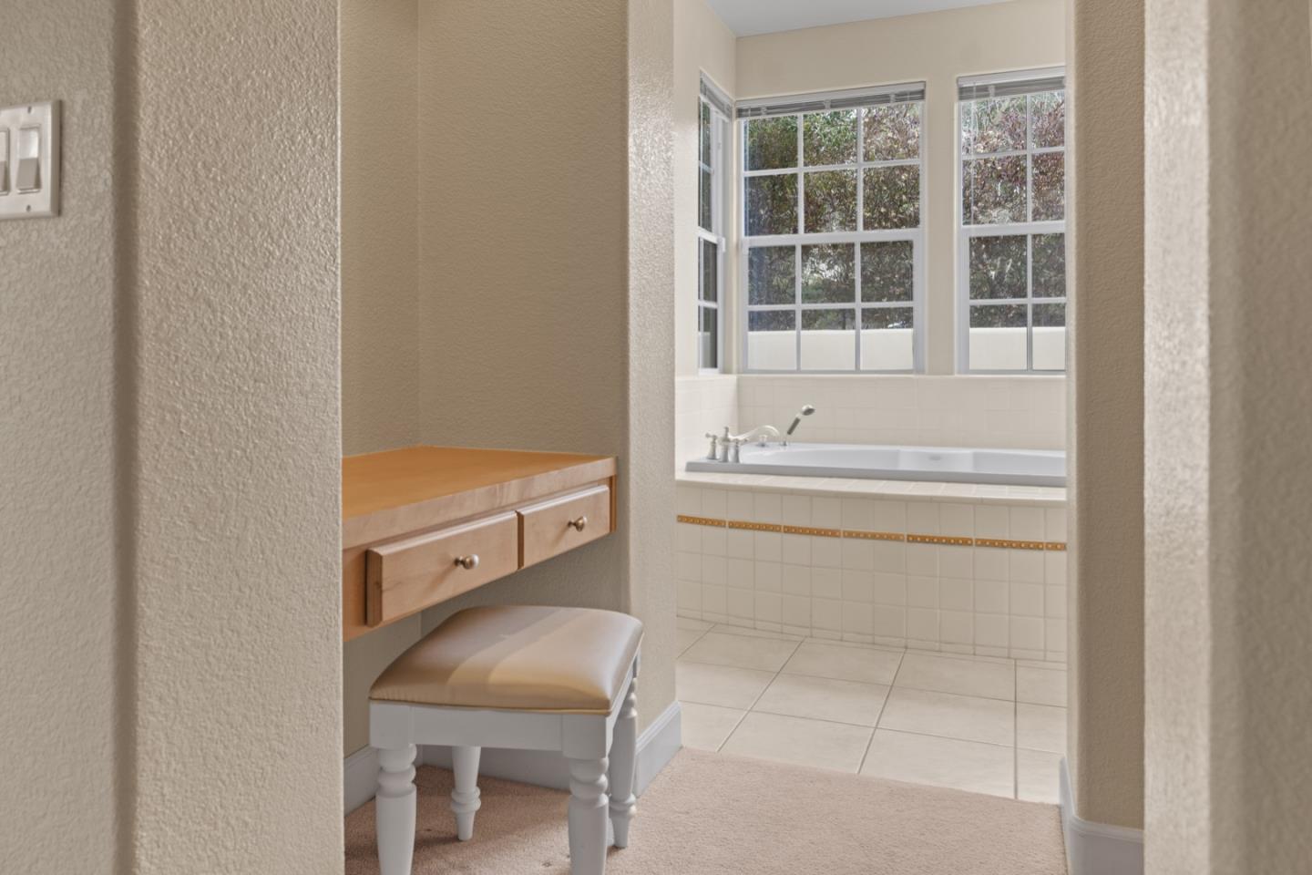 306 Pasadera Drive Monterey, CA 93940 - Photo 35 of 55 a bathroom with a bathtub and a sink