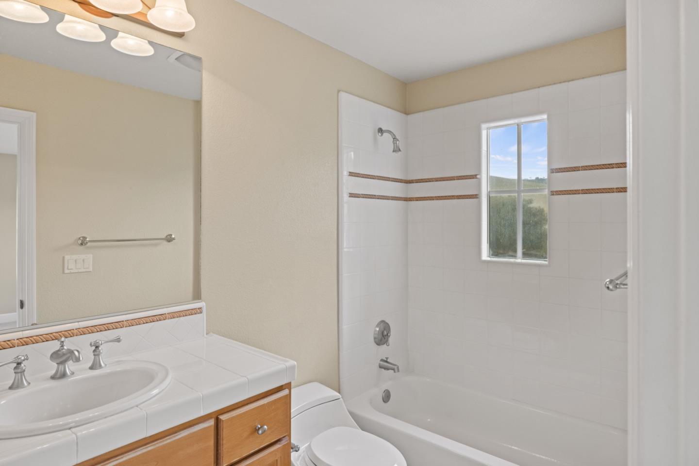 306 Pasadera Drive Monterey, CA 93940 - Photo 45 of 55 a bathroom with a sink a toilet and shower
