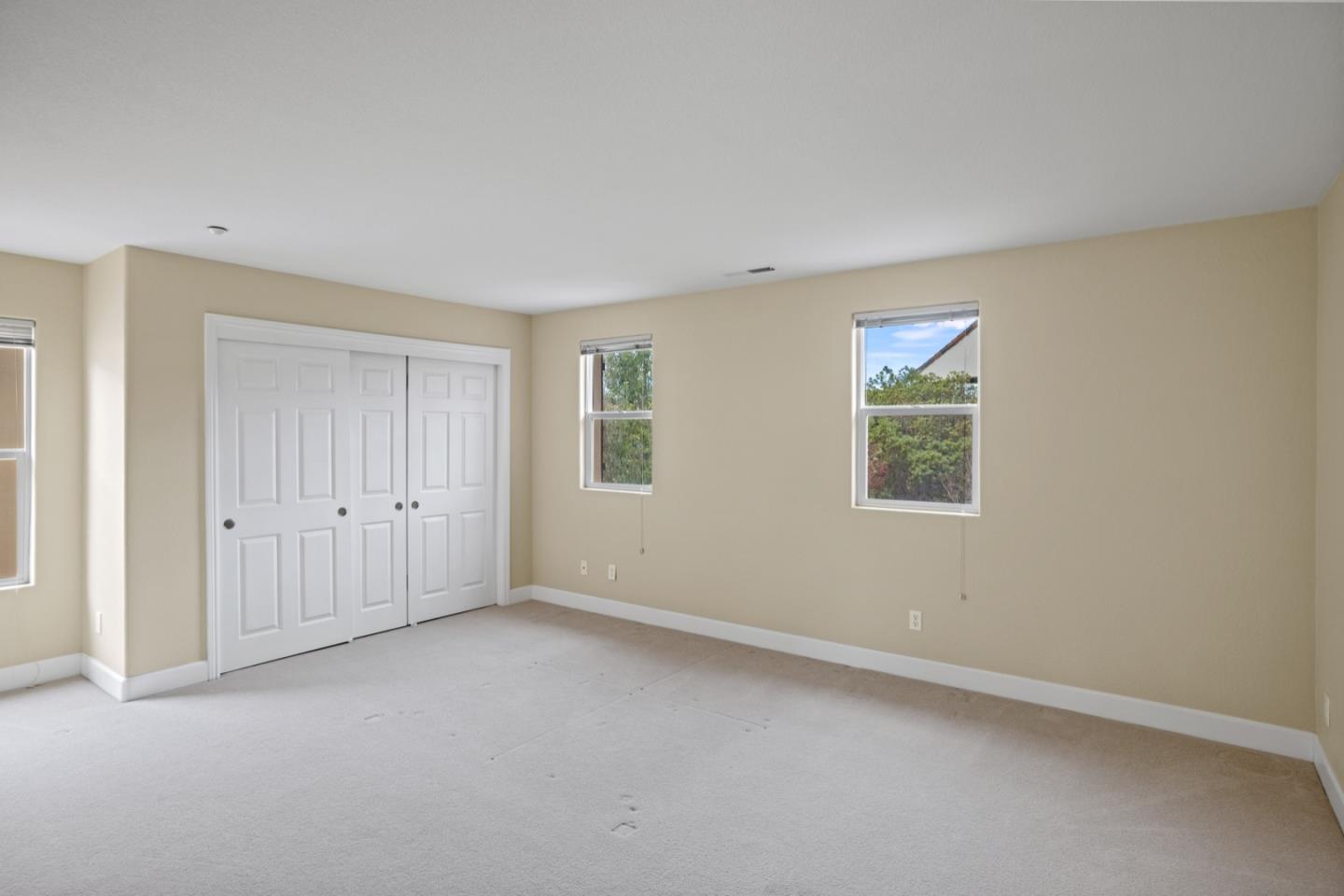 306 Pasadera Drive Monterey, CA 93940 - Photo 46 of 55 an empty room with windows