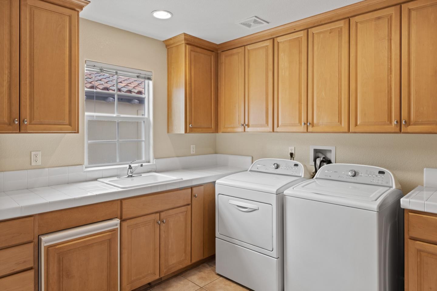 306 Pasadera Drive Monterey, CA 93940 - Photo 49 of 55 a utility room with dryer and washer