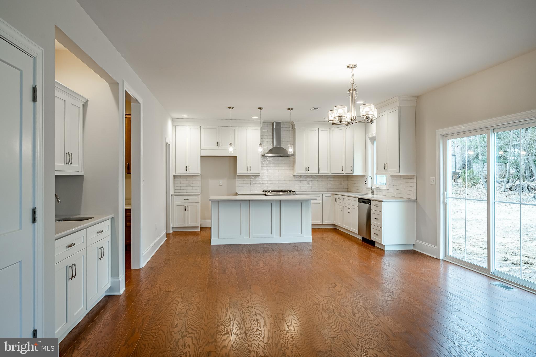 1107 Vilsmeier Road Lansdale, PA 19446 - Photo 12 of 58 a large kitchen with cabinets wooden floor and stainless steel appliances