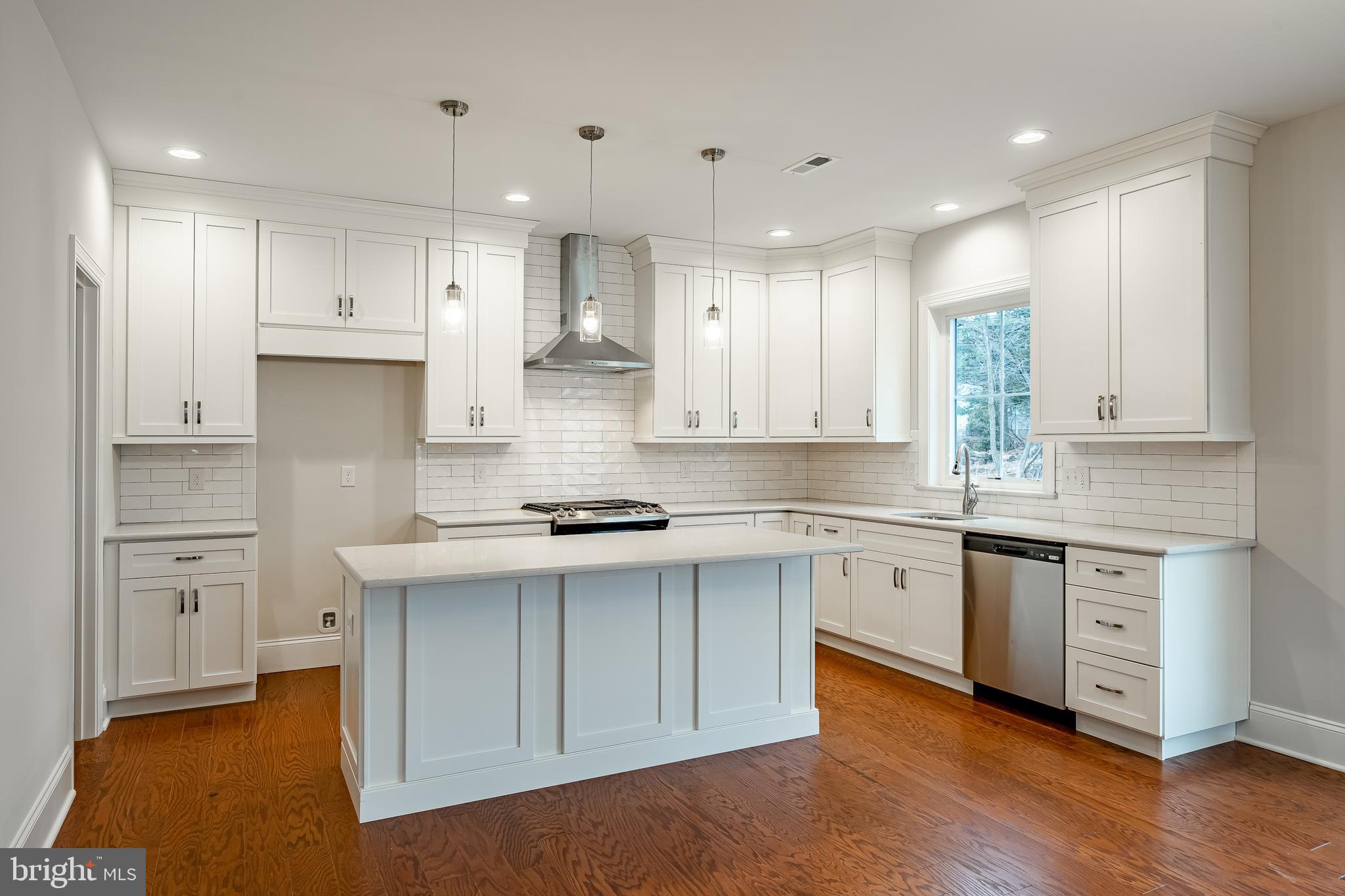 1107 Vilsmeier Road Lansdale, PA 19446 - Photo 15 of 58 a kitchen with stainless steel appliances granite countertop a stove a sink and a refrigerator