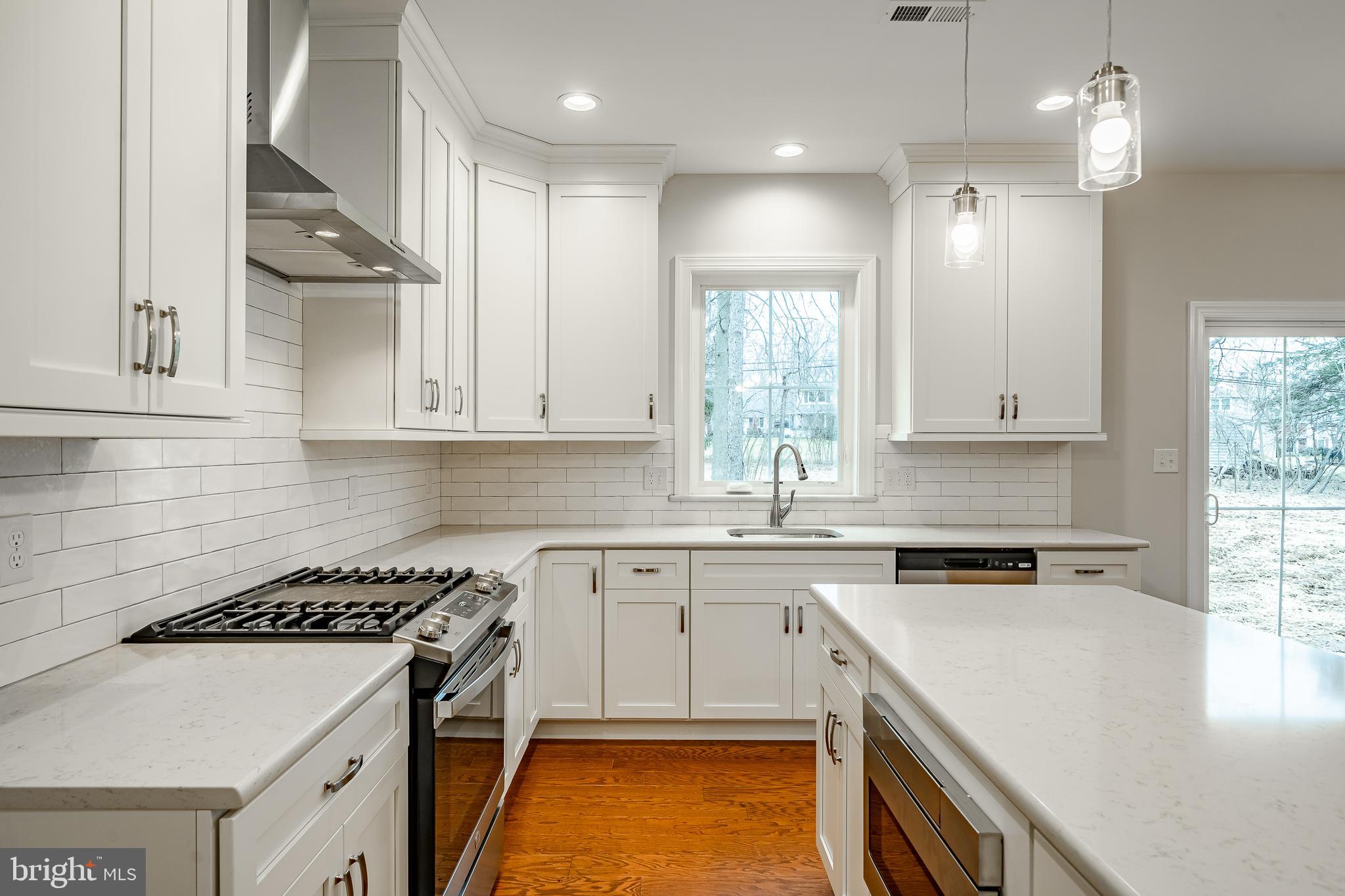 1107 Vilsmeier Road Lansdale, PA 19446 - Photo 18 of 58 a kitchen that has a sink a stove and a window