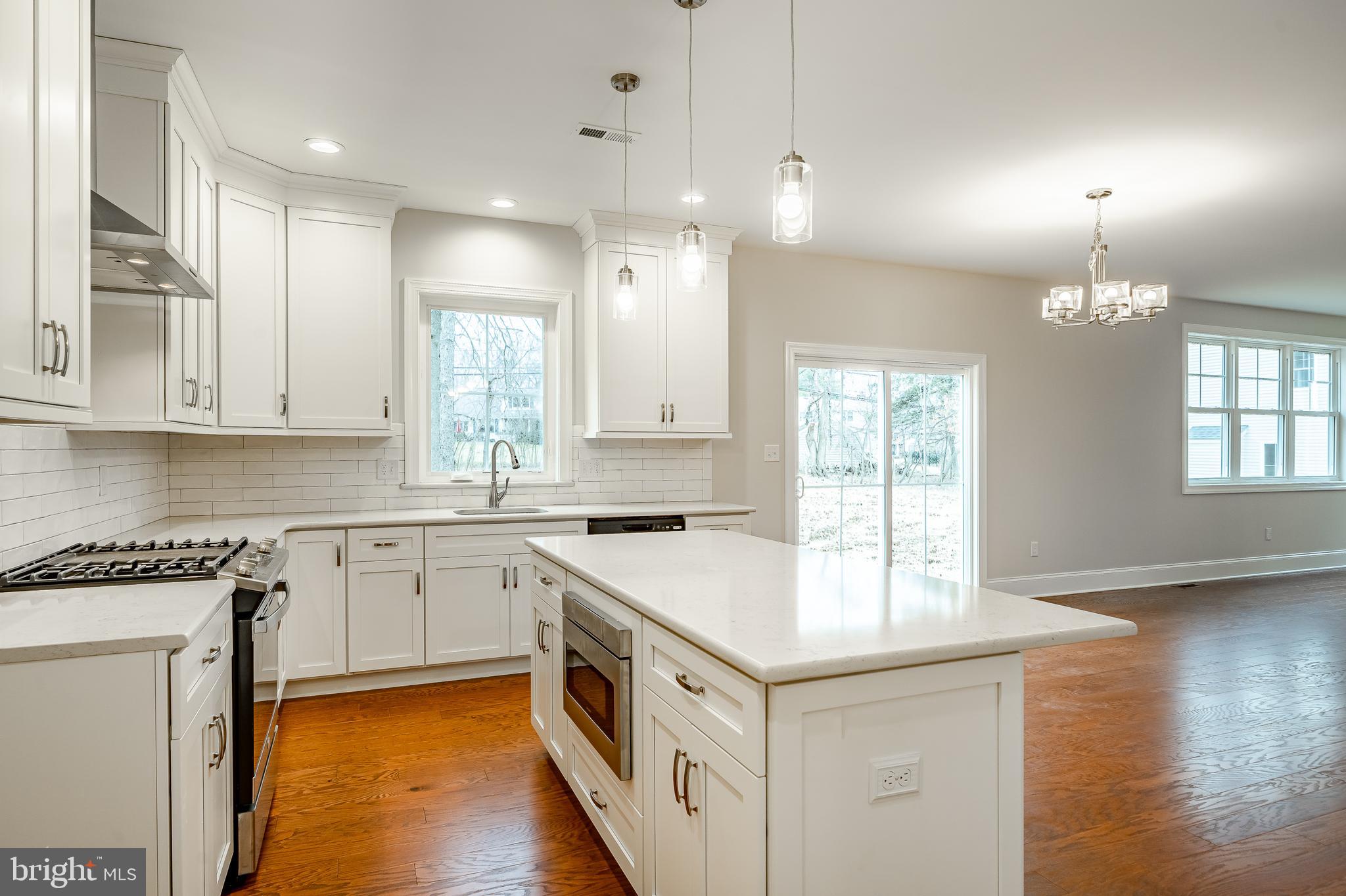 1107 Vilsmeier Road Lansdale, PA 19446 - Photo 19 of 58 a kitchen with a sink stove and cabinets