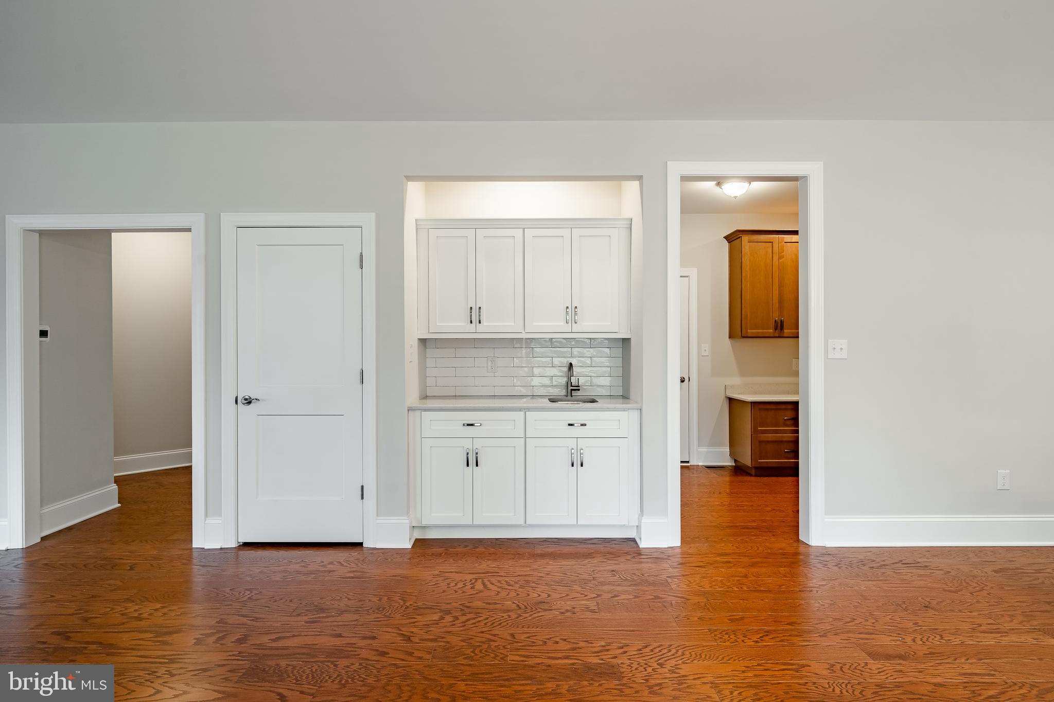 1107 Vilsmeier Road Lansdale, PA 19446 - Photo 23 of 58 a view of a kitchen with wooden floor and a sink