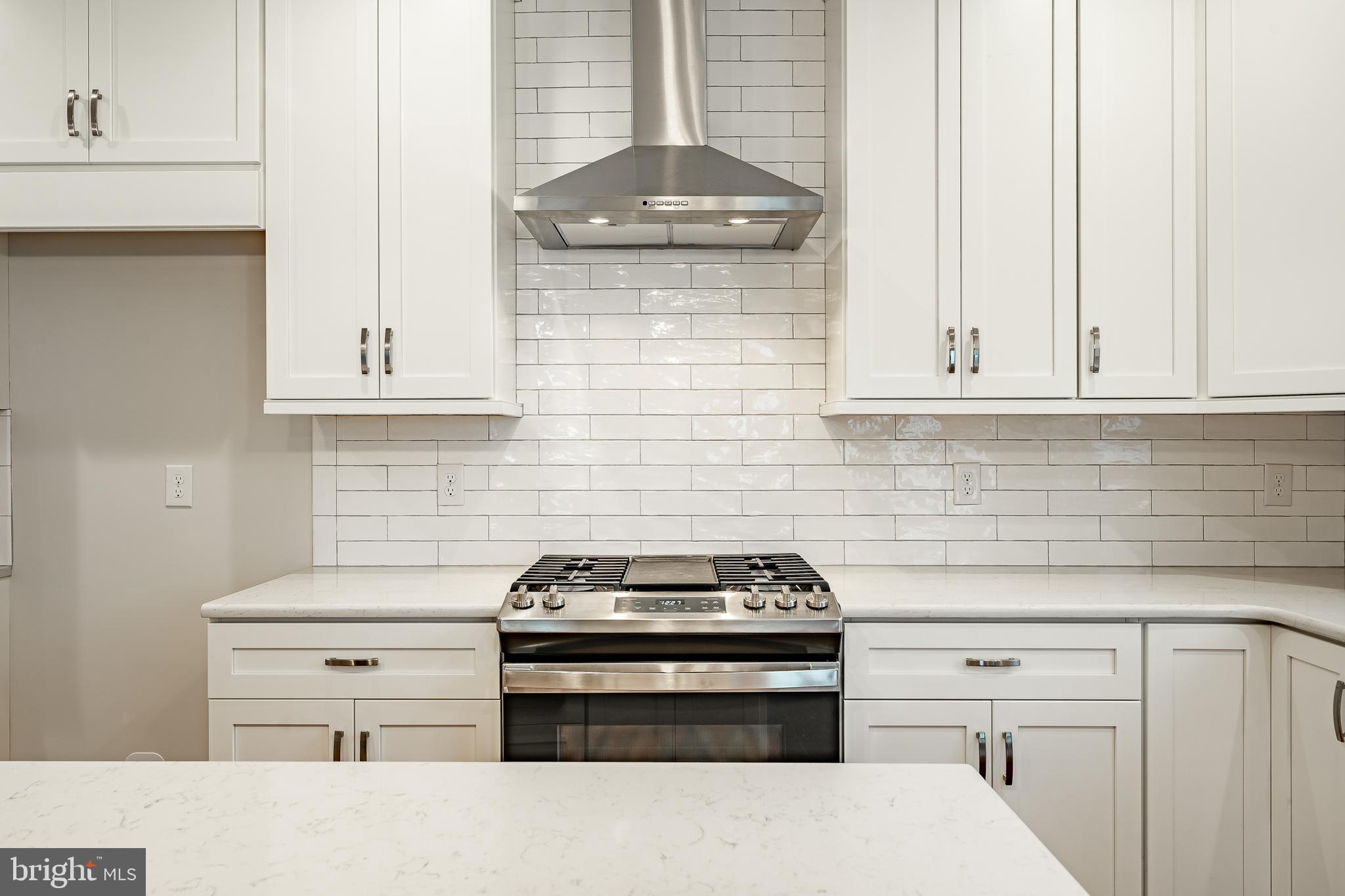 1107 Vilsmeier Road Lansdale, PA 19446 - Photo 24 of 58 a kitchen with granite countertop white cabinets and stainless steel appliances