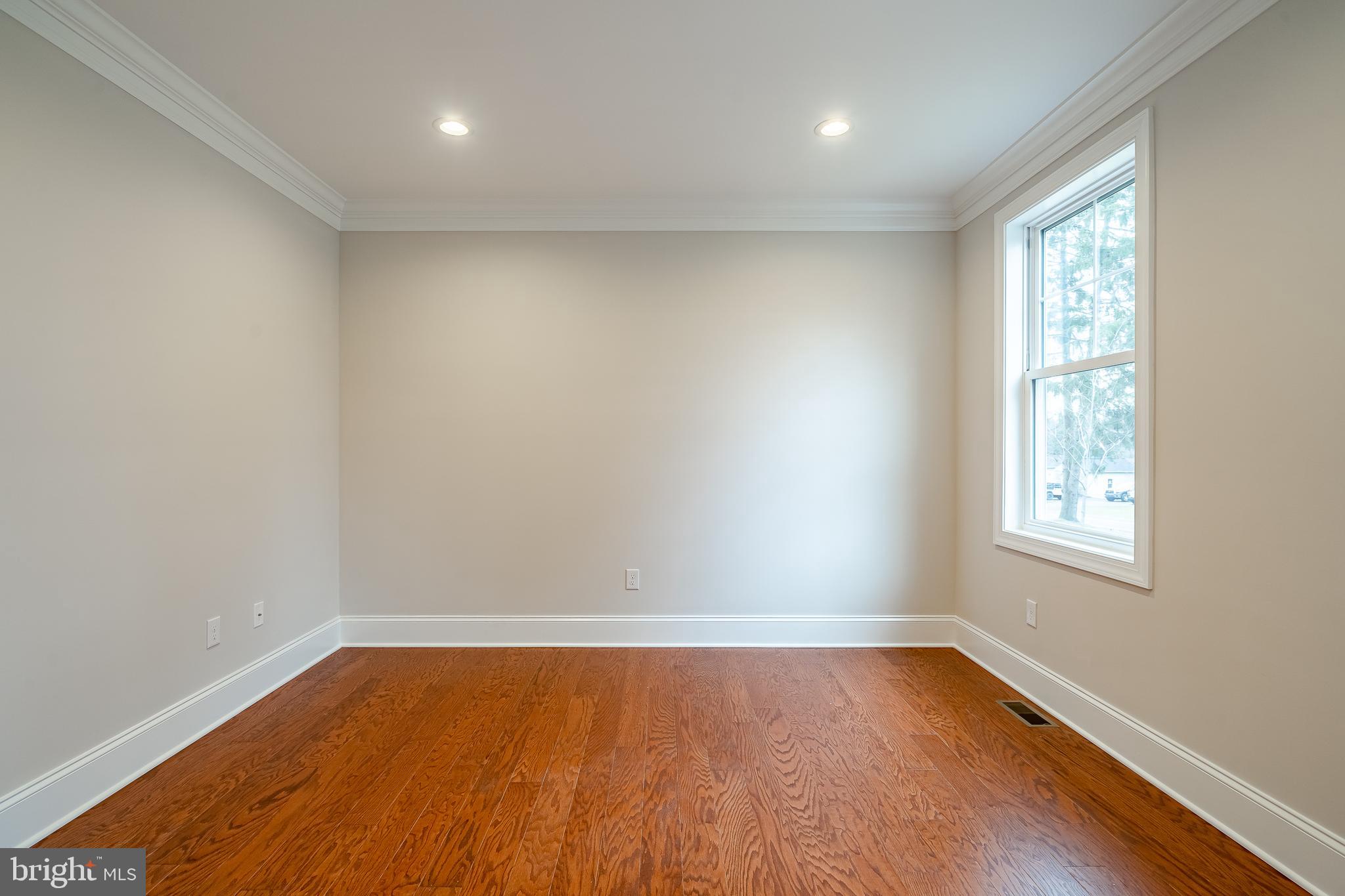 1107 Vilsmeier Road Lansdale, PA 19446 - Photo 10 of 58 wooden floor in an empty room with a window