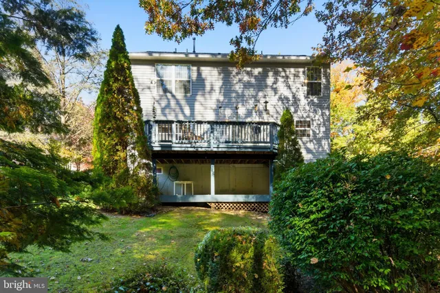 a view of a house with a tree