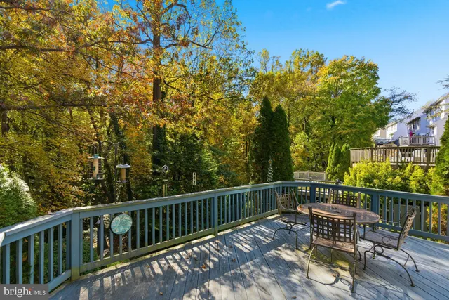 a view of a tree in front of a yard