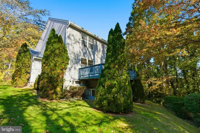 a view of a house with a tree