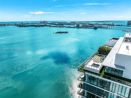 a view of a lake with a yard