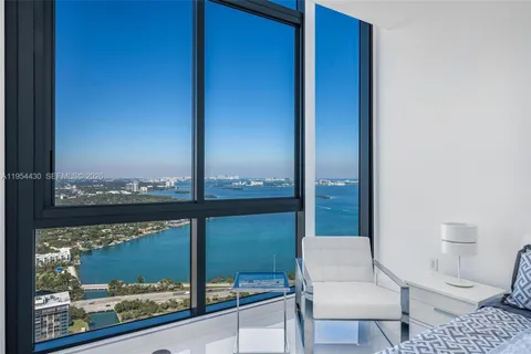 a view of a city and ocean view