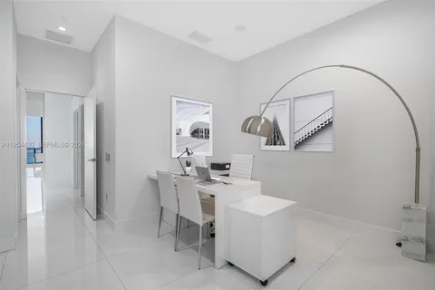 a view of water with a tall building