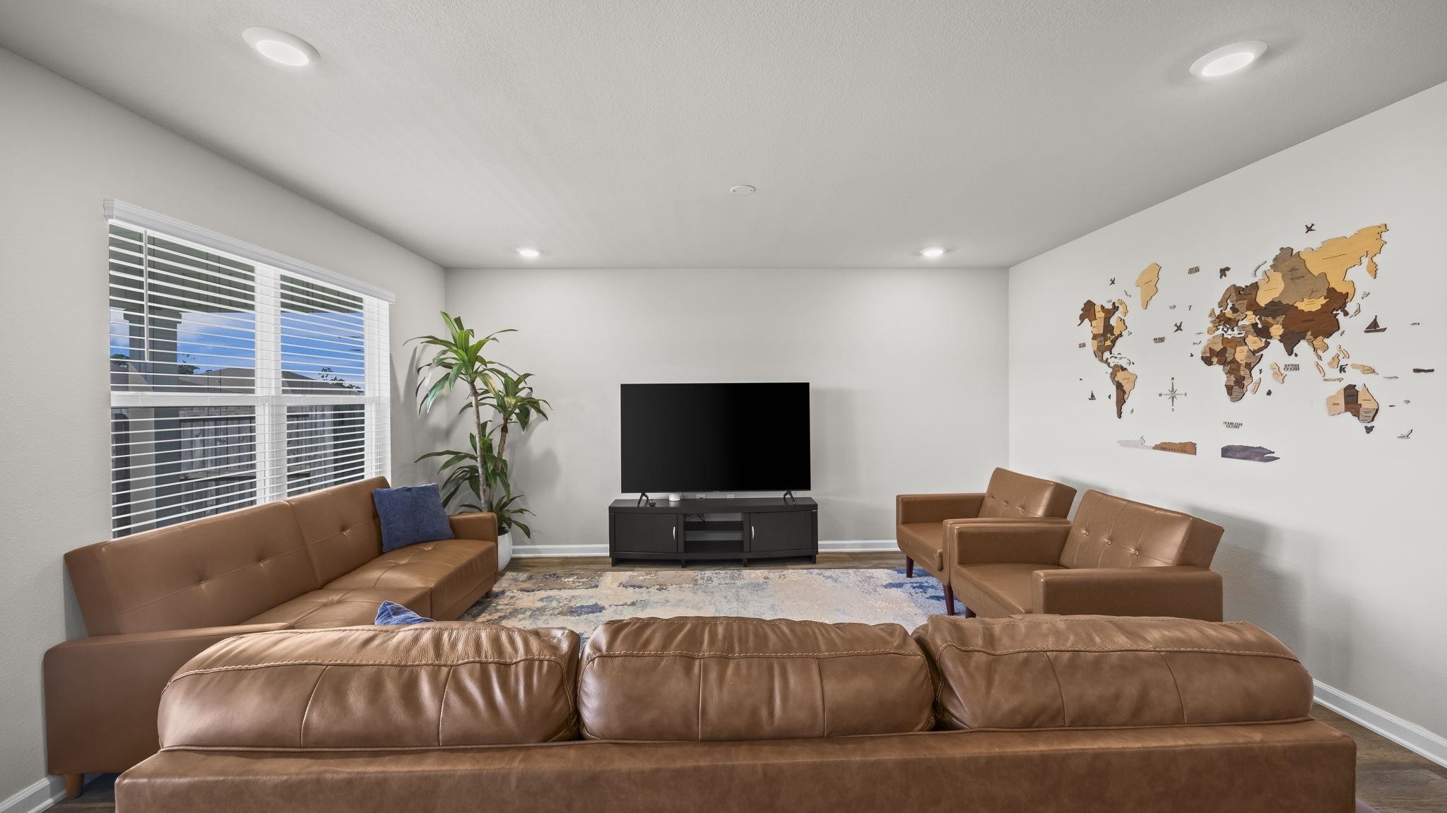 224 Burnston Way Foley, AL 36535 - Photo 12 of 42 Living area featuring baseboards and recessed lighting
