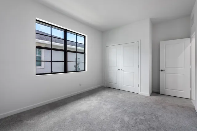 an empty room with windows