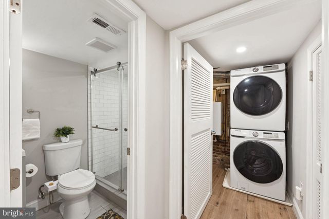a bathroom with a toilet and a sink