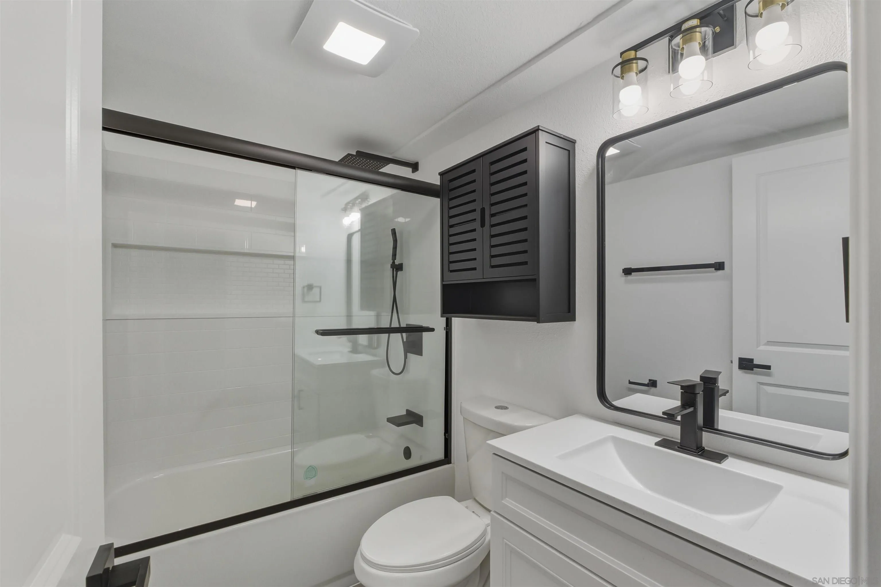 11618 Johnson Lake Road Lakeside, CA 92040 - Photo 4 of 25 a bathroom with a sink toilet and shower