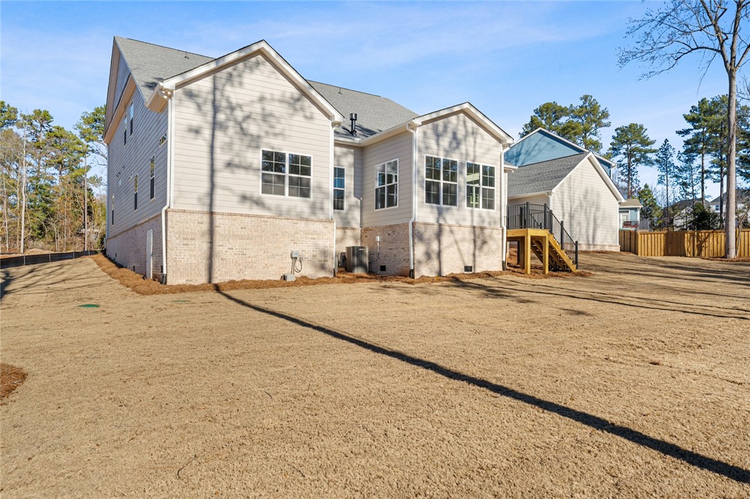 141 Rickys Path Easley, SC 29642 - Photo 39 of 40 This newly constructed residence showcases a well-maintained exterior with a sprawling backyard.