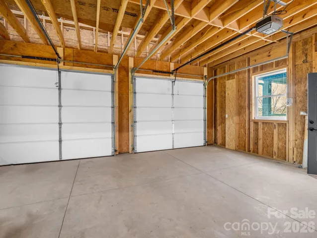 a view of a room with wooden walls