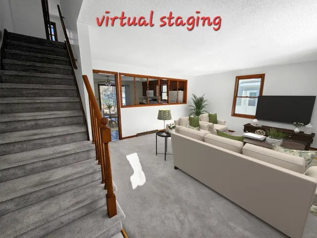 a kitchen with stainless steel appliances granite countertop a refrigerator a stove top oven a sink and dishwasher