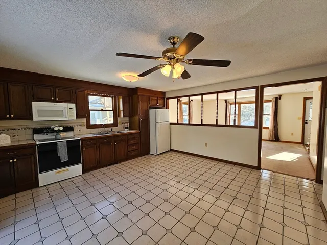 a bathroom with sink and mirror
